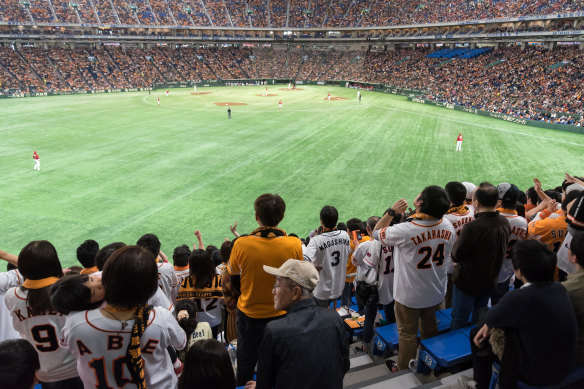 A baseball game at Tokyo Dome Stadium.