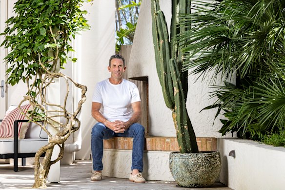 Anthony Wyer in his own garden. His  recently released book, Harbourside Gardens, is a glossy ode to Sydney’s iconic waterfront.