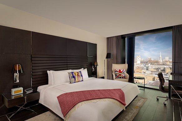 London views from floor-to-ceiling windows.