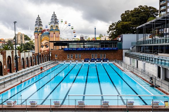The 50-metre outdoor pool is flanked by the historic art deco wall and a new 970-seat grandstand.