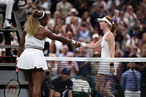 Serena Williams and Maya Joint shake hands at the net.