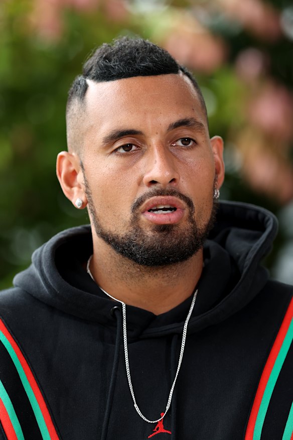 Nick Kyrgios speaks with the media at the ATP Cup on Saturday.