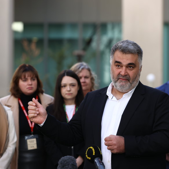 CEO and founder of the Asylum Seeker Resource Centre Kon Karapanagiotidis speaking at Parliament House in Canberra in May, has also called for decent family violence support provisions for temporary visa holders.