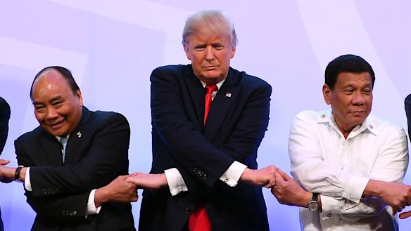 Nguyen Xuan Phuc, with Donald Trump and Philippine President Rodrigo Duterte at the ASEAN-US summit last year.