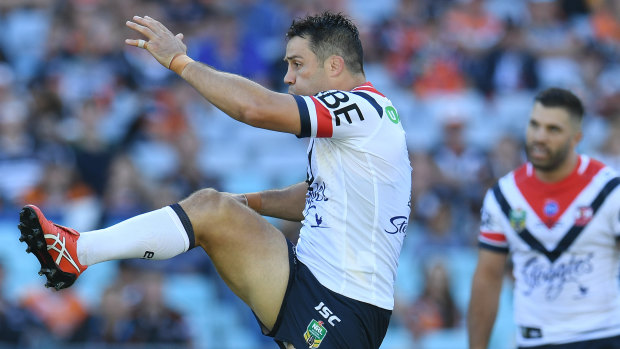 Ever reliable: Cooper Cronk launches a kick in a typically faultless display.
