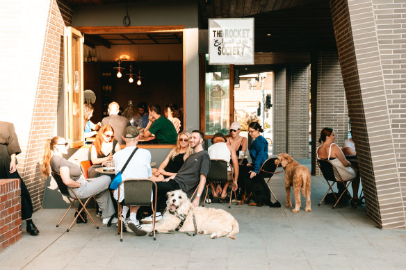Bar hounds outside The Rocket Society.
