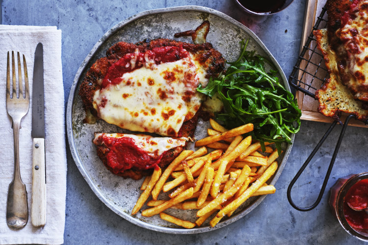 Serve the chips next to, not under, your chicken parmigiana.