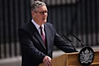 Keir Starmer announces his resignation in emotional address outside 10 Downing Street.