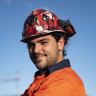 Tackling Heartbreak Hill with a hard hat and high vis vest