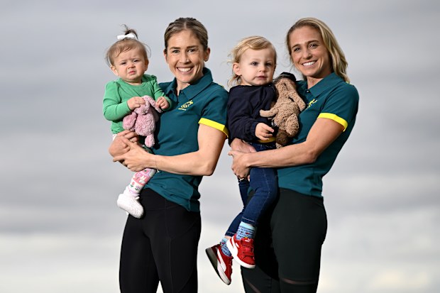 MELBOURNE, AUSTRALIA - JUNE 03: Australian Marathon athletes Jessica Stenson with daughter Ellie Stenson and Genevieve Gregson with son Archer Gregson pose during the Australian 2024 Paris Olympic Games Marathon Team Announcement at Lakeside Stadium on June 03, 2024 in Melbourne, Australia. (Photo by Quinn Rooney/Getty Images)