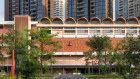 The New Bahru lifestyle precinct is housed in a former high school built around a shaded lawn.