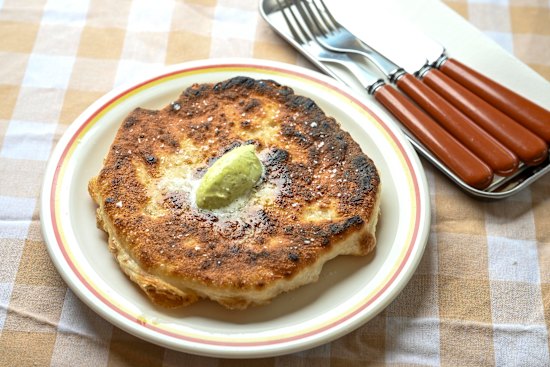 Flatbreads are lathered in whipped spring onion butter like Macca’s hotcakes gone salty.
