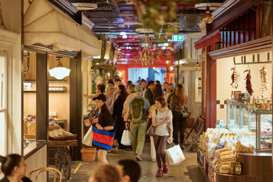 Shoppers preview the new CBD food hub on Monday before Wednesday’s official launch.