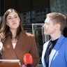 Brittany Higgins, centre, spoke outside the ACT Supreme Court after the first trial was aborted, with Heidi Yates standing on the right.