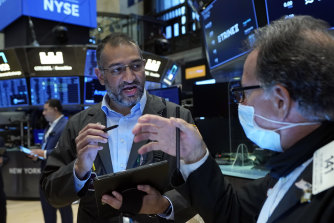 A late rally helped Wall Street pare its losses for the day. 
