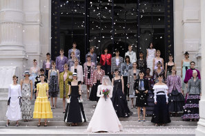 Virginie Viard with models on the runway during the Chanel Couture Haute Couture Fall/Winter 2021/2022 show as part of Paris Fashion Week, 2021.