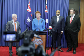 Queensland One Nation senators Malcolm Roberts and Pauline Hanson at an April press conference to announce former Adani executive Raj Guruswamy and former Morrison government backbencher George Christensen as fellow upper house candidates below Hanson on the state’s senate ticket.
