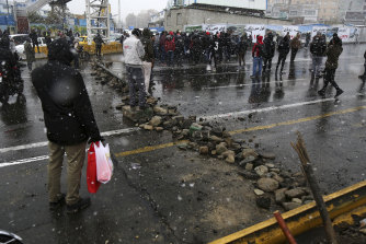 A road is blocked by protesters in the capital, Tehran, in mid-November. 