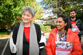 Labor candidate Michelle Ananda-Rajah (right) was supported by Senator Penny Wong at the pre-poll station in Malvern.