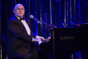 Phil Scott has corralled friends into a cabaret (possibly at gunpoint).