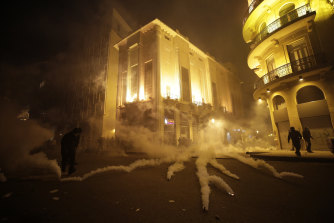 Tear-gas was fired in a futile attempt to disperse anti-government protesters.