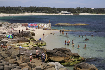 Crowds find refuge from the heat at Yarra Bay.