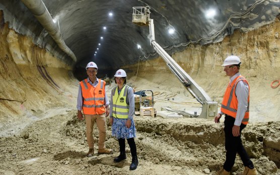 Transport Minister Andrew Constance, left, Premier Gladys Berejiklian and Rodd Staples inspect a Metro station site.