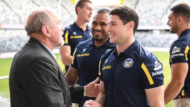 Ray Price greets Mitchell Moses at the Parramatta Eels’ 75th anniversary luncheon.