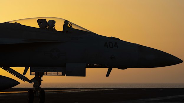 A fighter jet on the deck of the USS Dwight D. Eisenhower in the Red Sea.