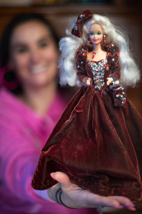 Chrystal Palmer with the first Barbie she had as a girl.