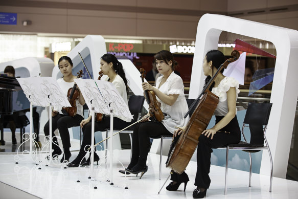 Endless ways to pass the time … a string quartet plays a live set at Incheon.