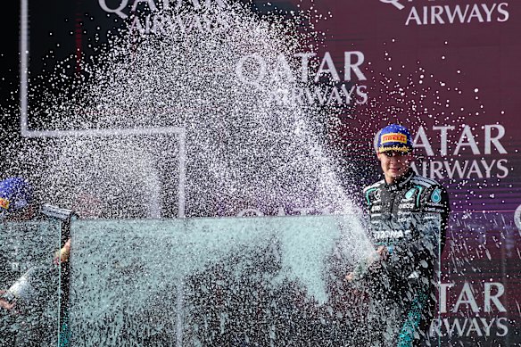 Russell celebrates his Formula 1 win the traditional way.