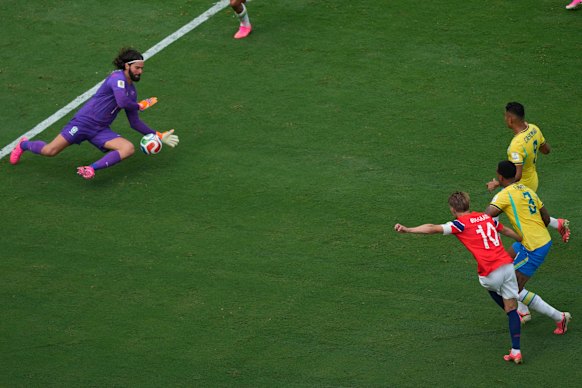 Alisson saved Odegaard's shot just before half-time.