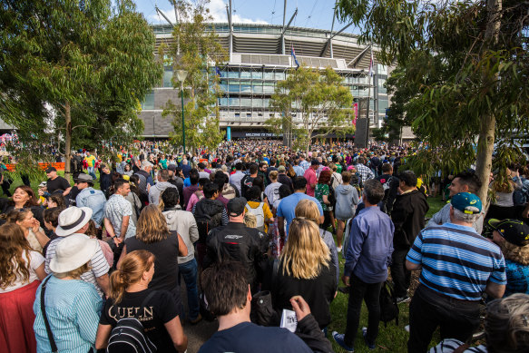 Crowds of people pour into the MCG for the Women's T20 World Cup final in March.