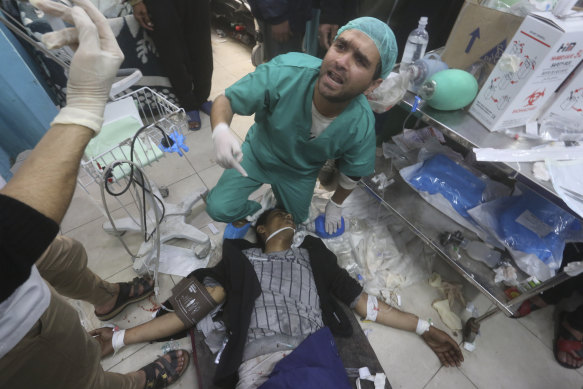 A Palestinian wounded during the Israeli air and ground offensive in Khan Younis is treated at a hospital in Rafah, Gaza Strip, on Tuesday.