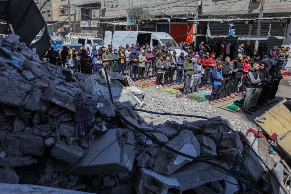 Palestinians perform the first Friday prayer of the holy mo<em></em>nth of Ramadan on the ruins of Al-Huda Mosque.