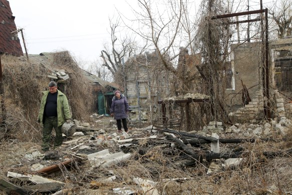 Local citizens visit their home in the separatist-controlled territory to collect belongings after a recent shelling near a frontline outside Donetsk, eastern Ukraine in April. 