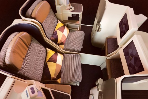 Etihad Airways’ B777-300 business seats can turn into a flatbed.