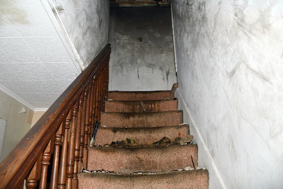 A stairway inside the home where a Connecticut man told authorities his stepmother held him captive.