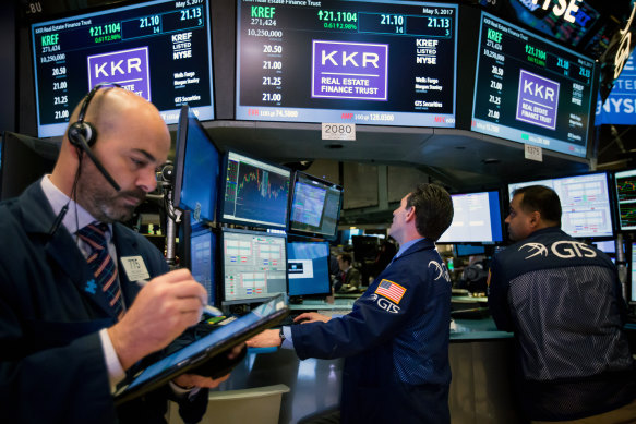 Traders work on the floor of the New York Stock Exchange.

KKR / GTS