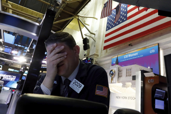 A trader on the floor of the New York Stock Exchange. 