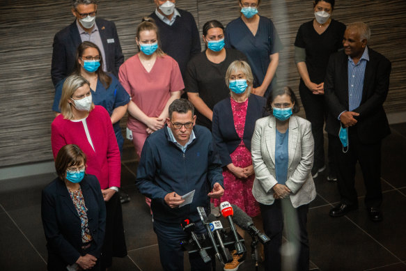 Flanked by nurses and his colleagues, Daniel Andrews announced $44 million for PET scanners.