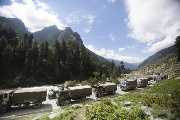 An Indian army convoy moves on the Srinagar-Ladakh highway at Gagangeer, north-east of Srinagar, Indian-controlled Kashmir.