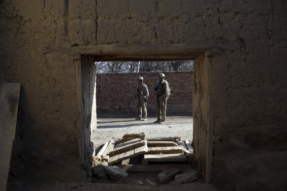 Security personnel patrol following an attack near the Bagram Air Base in Parwan province, Kabul, Afghanistan, on December 11. Bagram is the main American base north of the capital.