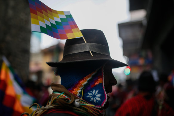 Pro-Morales protesters carried Wiphala flags, a symbol used by some of South America's indigenous peoples.