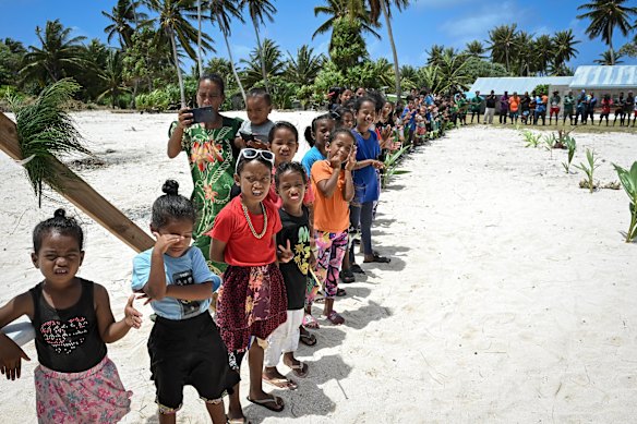 The welcoming party on the beach at Mejatto when the crew and passengers of the Rainbow Warrior III arrived.