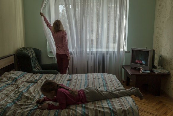 Olya, a Delivering Dreams surrogate, and her daughter in Lviv. “What’s on the roads here is scary,” she said of her 12-hour drive to safety.