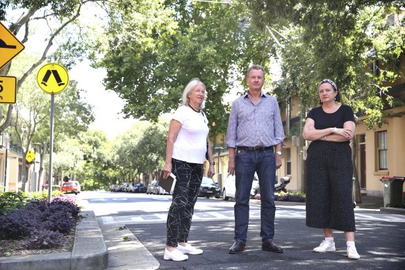Millers Point residents Margaret Wright, left, Bernard Kelly, and Yasmina Bonnet on Kent Street, along which the cycleway will be built.