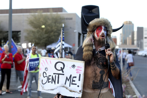 Jacob Anthony Chansley, whose face became synonymous with right-wing conspiracism, outside the Maricopa County Recorder’s Office in Arizona, in November 2020.