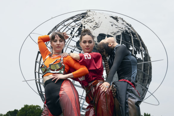 Haiku Hands (from left) Beatrice Lewis  and Claire and Mie Nakazawa strike a pose after performing at the Governor’s Ball in New York.
